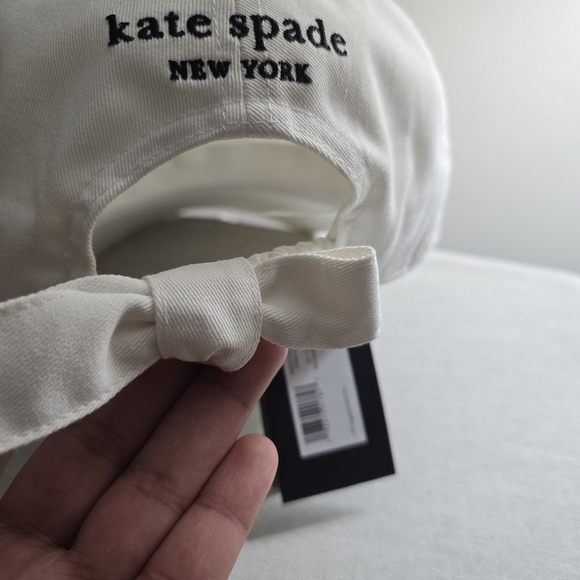 kate spade white baseball cap with gold and pink spade charm main image 5